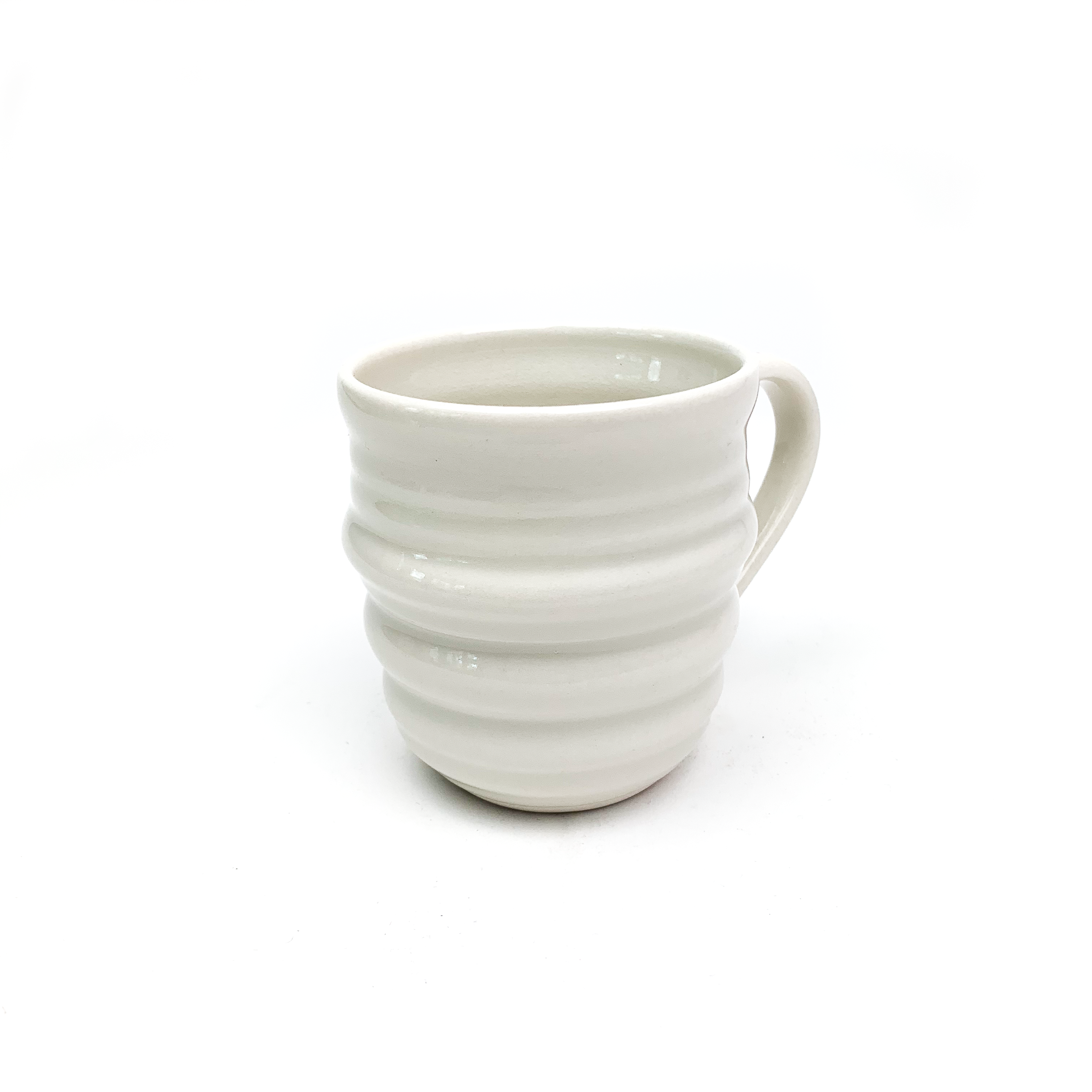 Tasse anse porcelaine