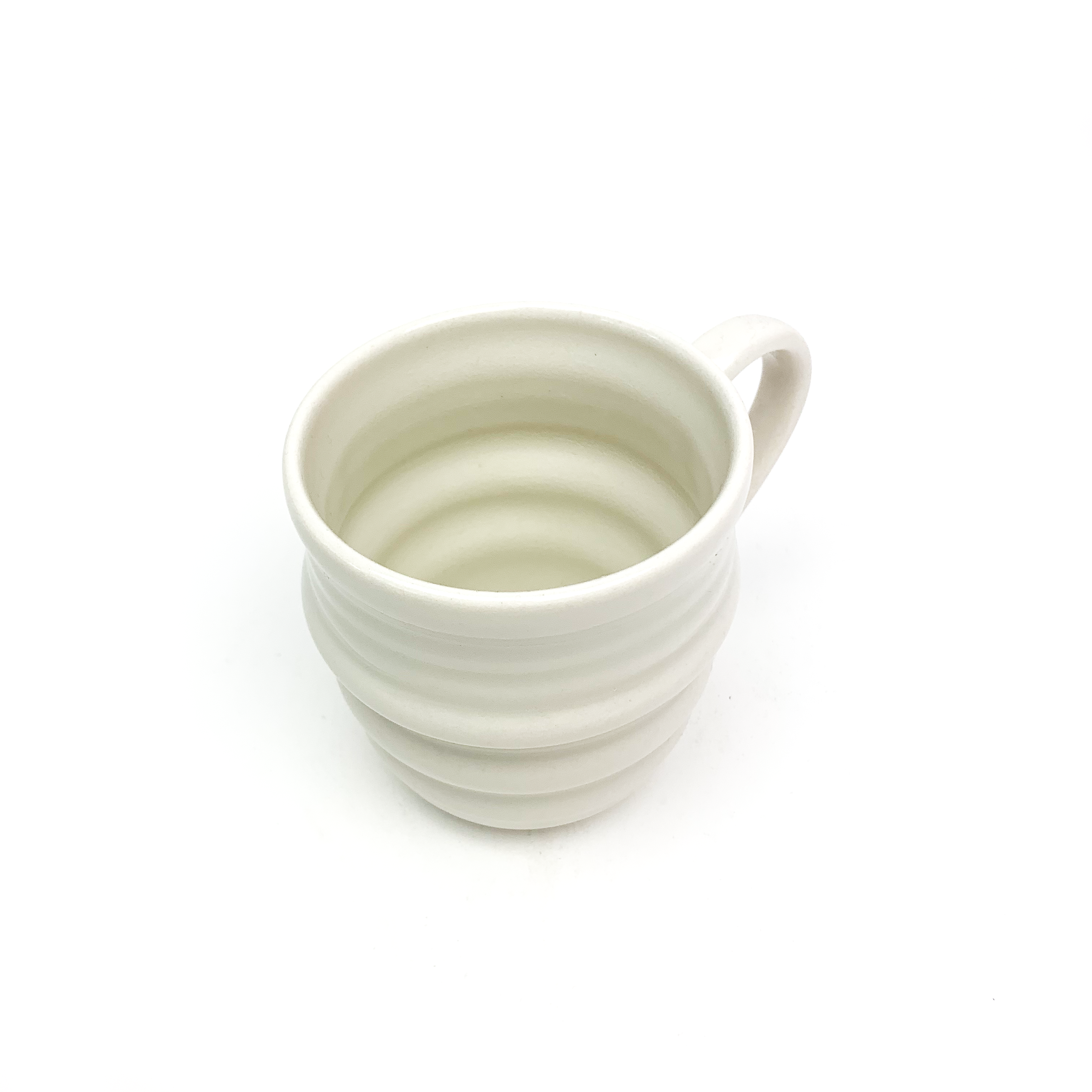 Tasse anse porcelaine