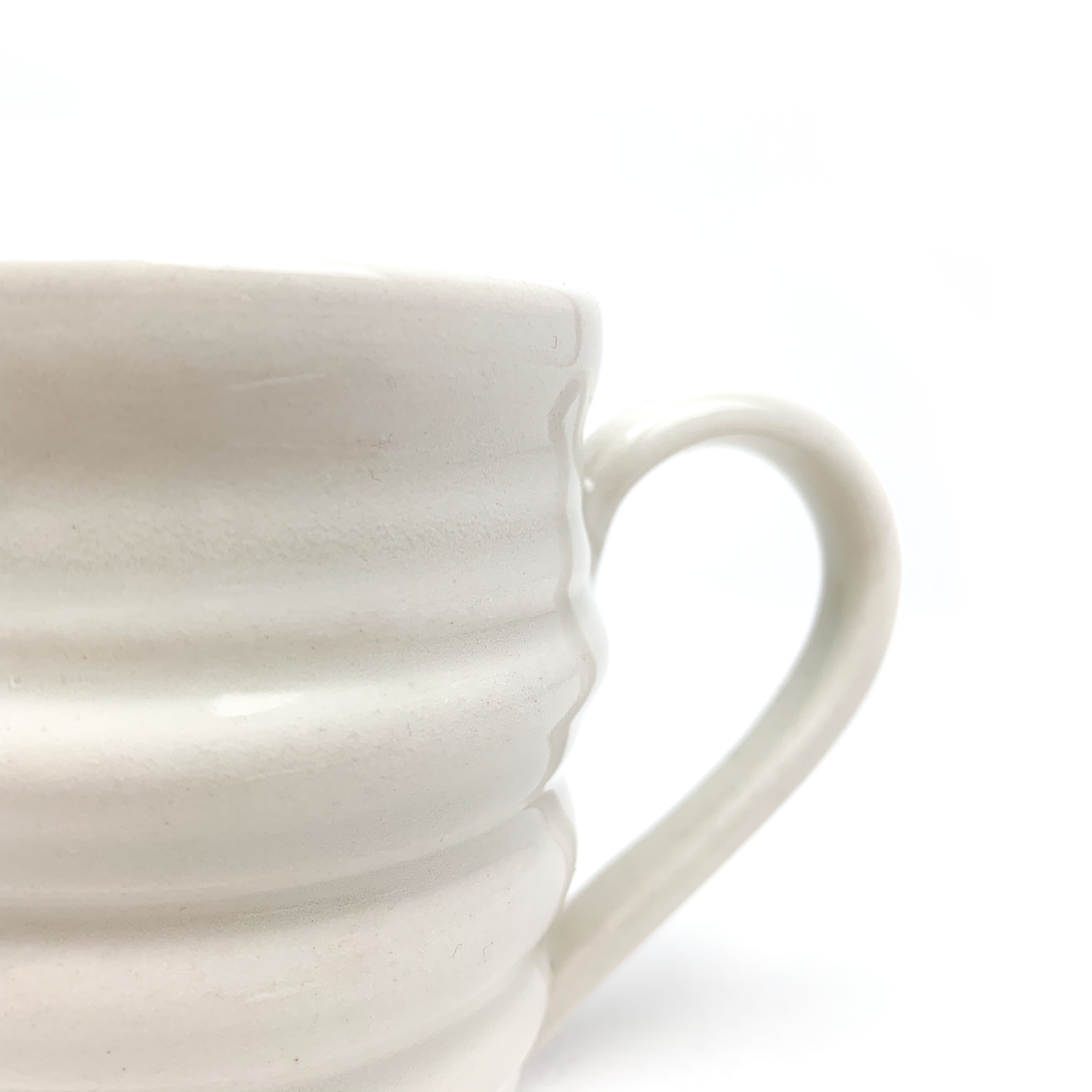 Tasse anse porcelaine